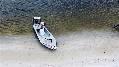 This mid-size dual console boat features World Cats famous smoother, more stable, drier ride, and it includes comfort features like a full-sized head enclosure, and seating for up to ten thanks to its big 86 beam. . South dade skiff review